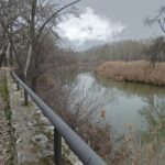 Gran crecida del Henares a su paso por la ciudad complutense