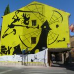 Un mismo mural del hermanamiento: Dos maneras de proteger el arte urbano
